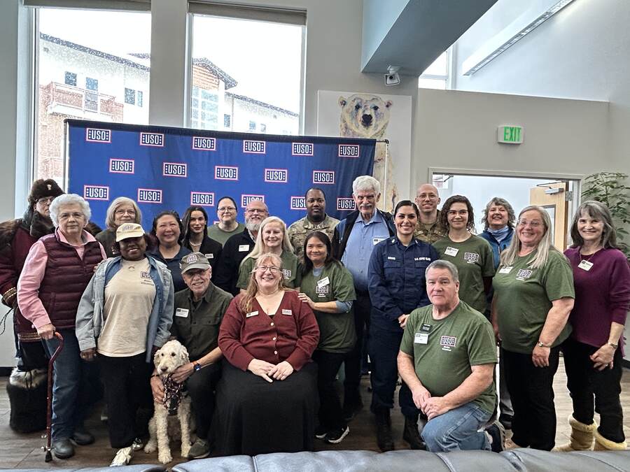 USO JBER staff, command leadership, patrons, and volunteers at the 10th anniversary celebration